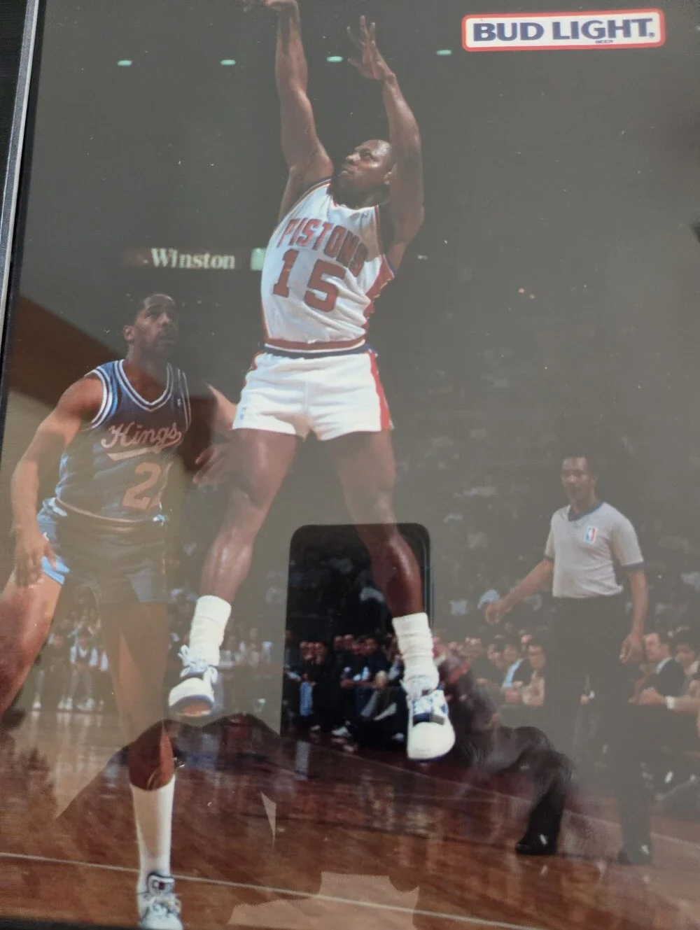 Framed display feat a vintage action photo of Detroit Pistons Vinnie Johnson